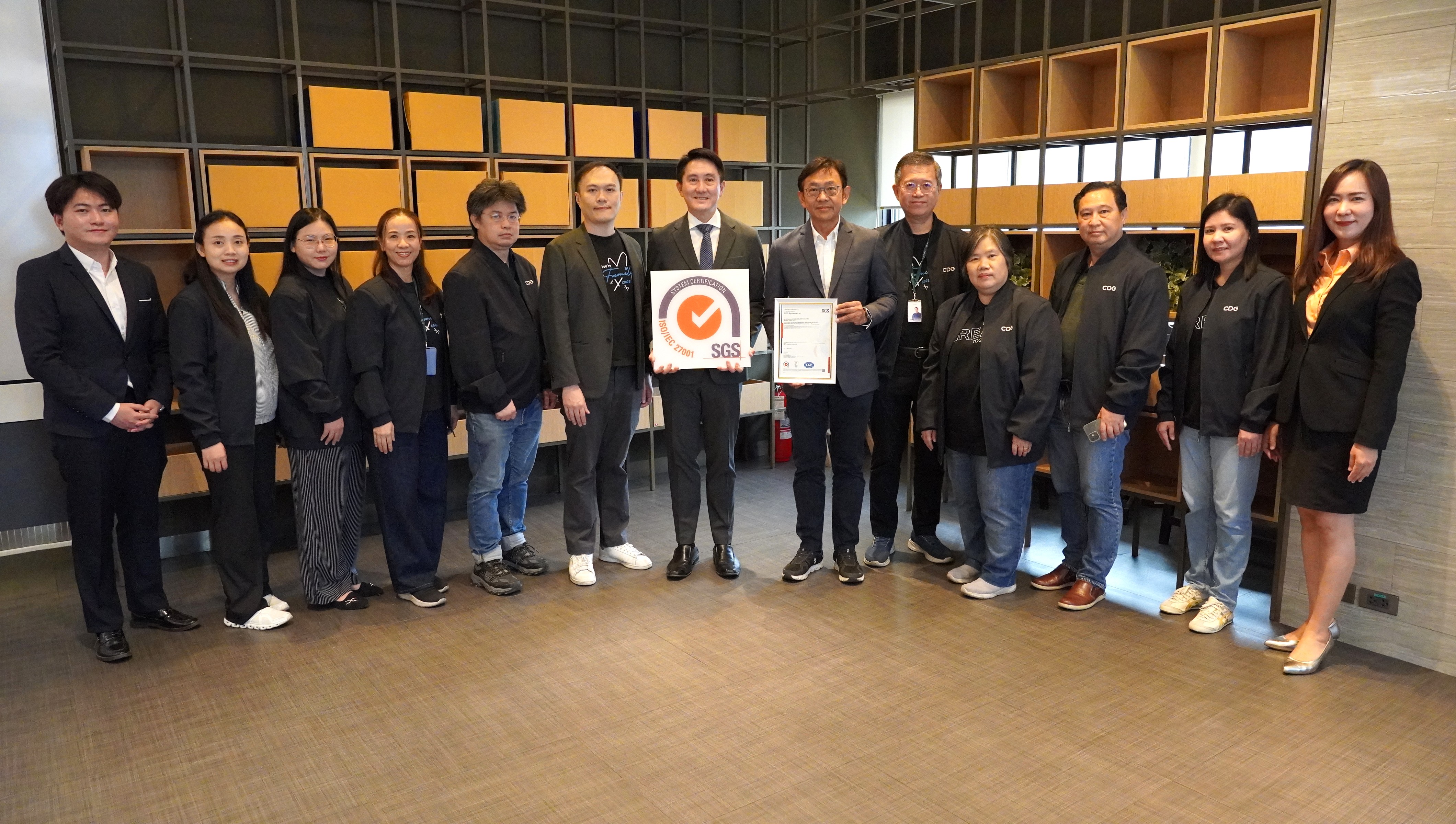 CDG Systems Limited management and team receiving ISO/IEC 27001 certification from SGS (Thailand)
