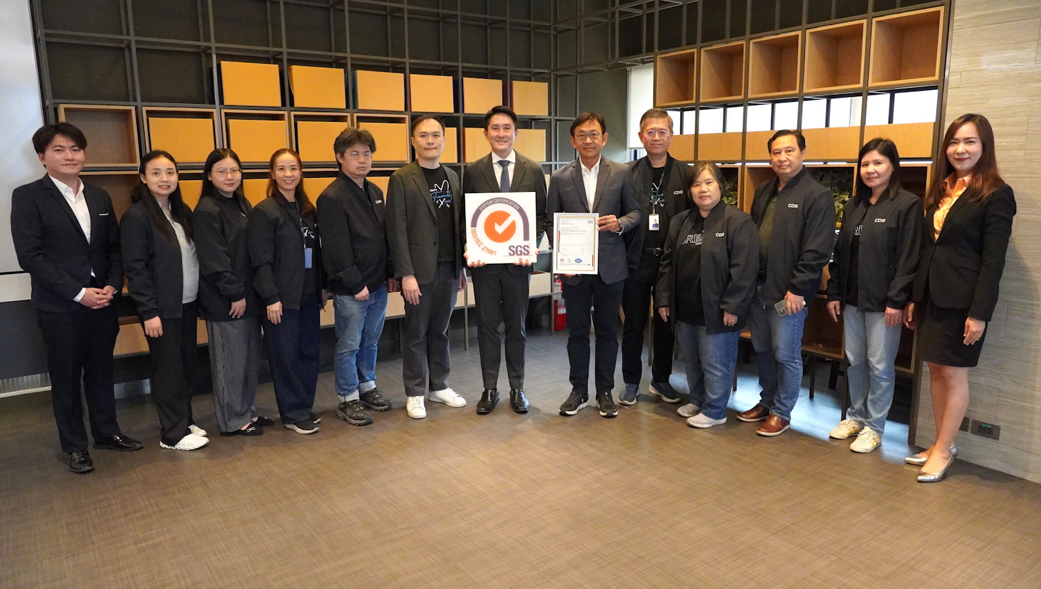 CDG Systems Limited management and team receiving ISO/IEC 27001 certification from SGS (Thailand)