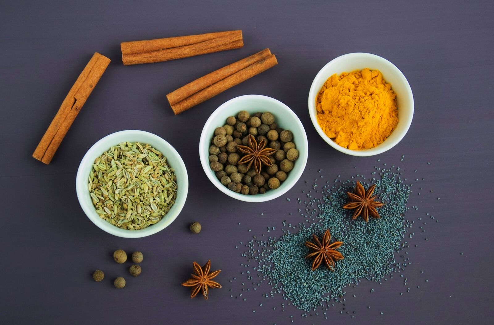 Assorted Spices Near White Ceramic Bowls