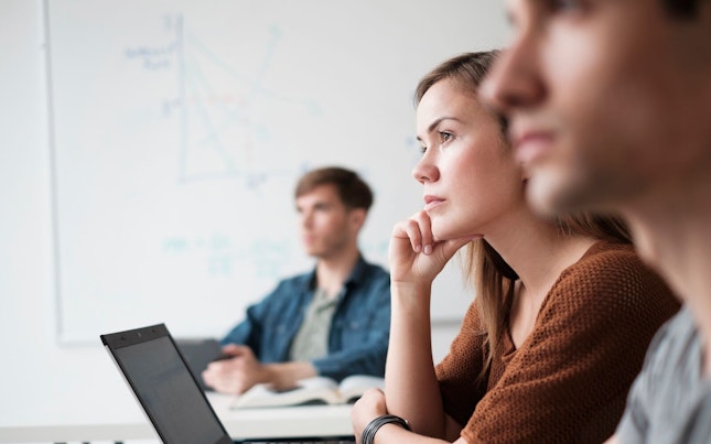 Business Colleagues Listening to a Presentation