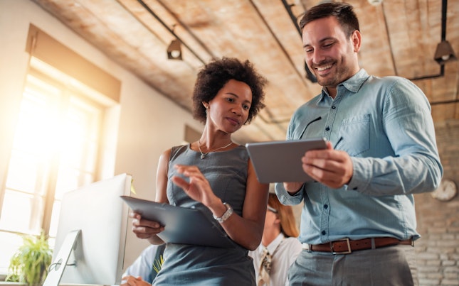 Business Colleagues Working Together in the Office