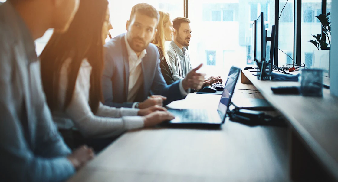 Business Colleagues Working with Laptops