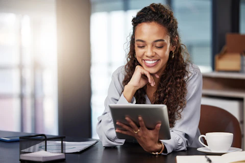 Business Woman Working Using a Digital Tablet