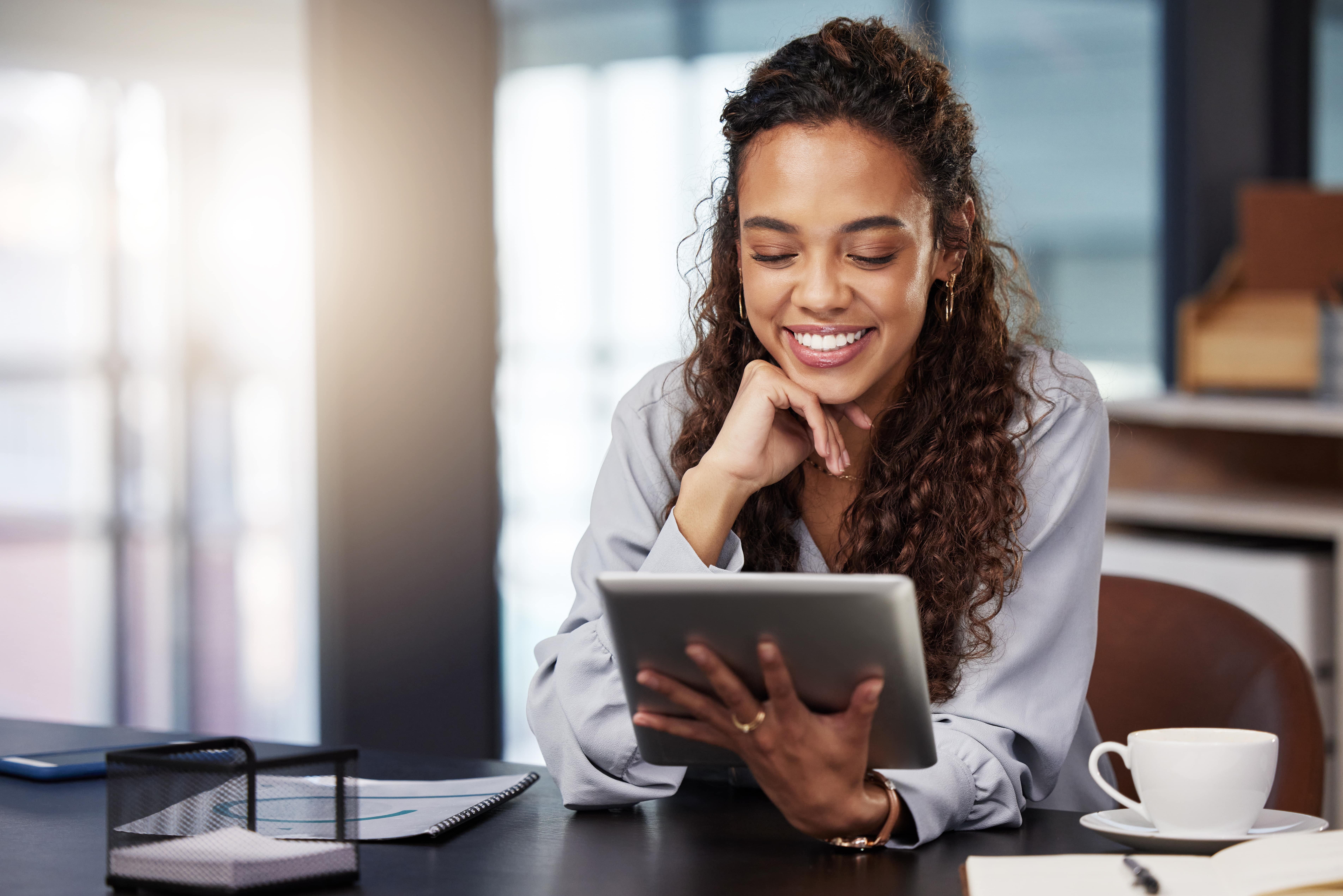 Business Woman Working Using a Digital Tablet
