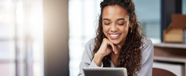 Business Woman Working Using a Digital Tablet