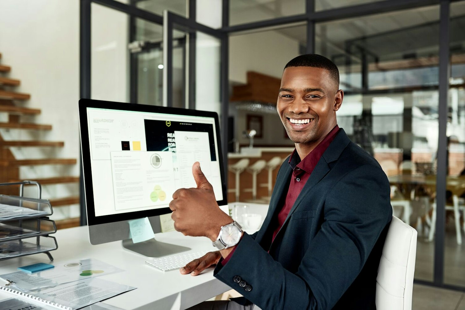 Businessman giving a thumbs up