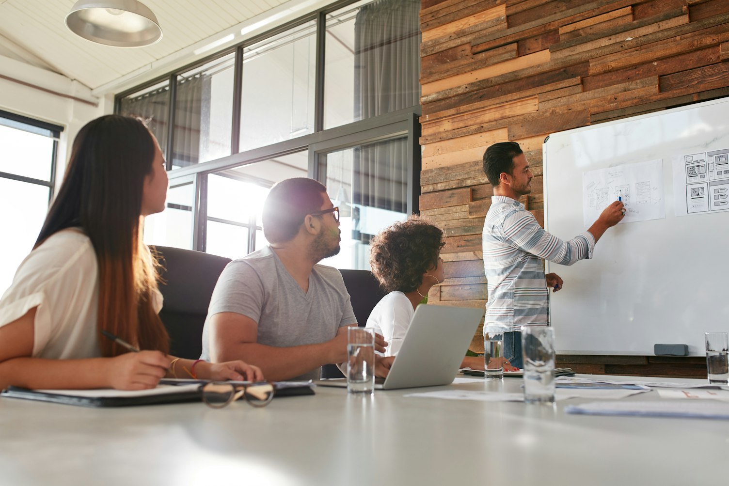 Businessman Giving Training Presentation to his Colleagues