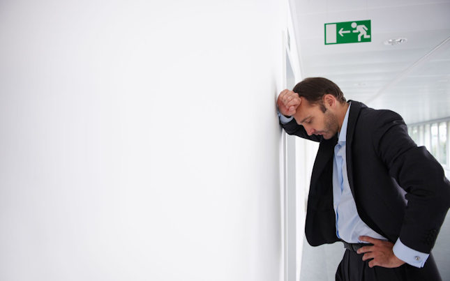 Businessman Looking Stressed at the Office