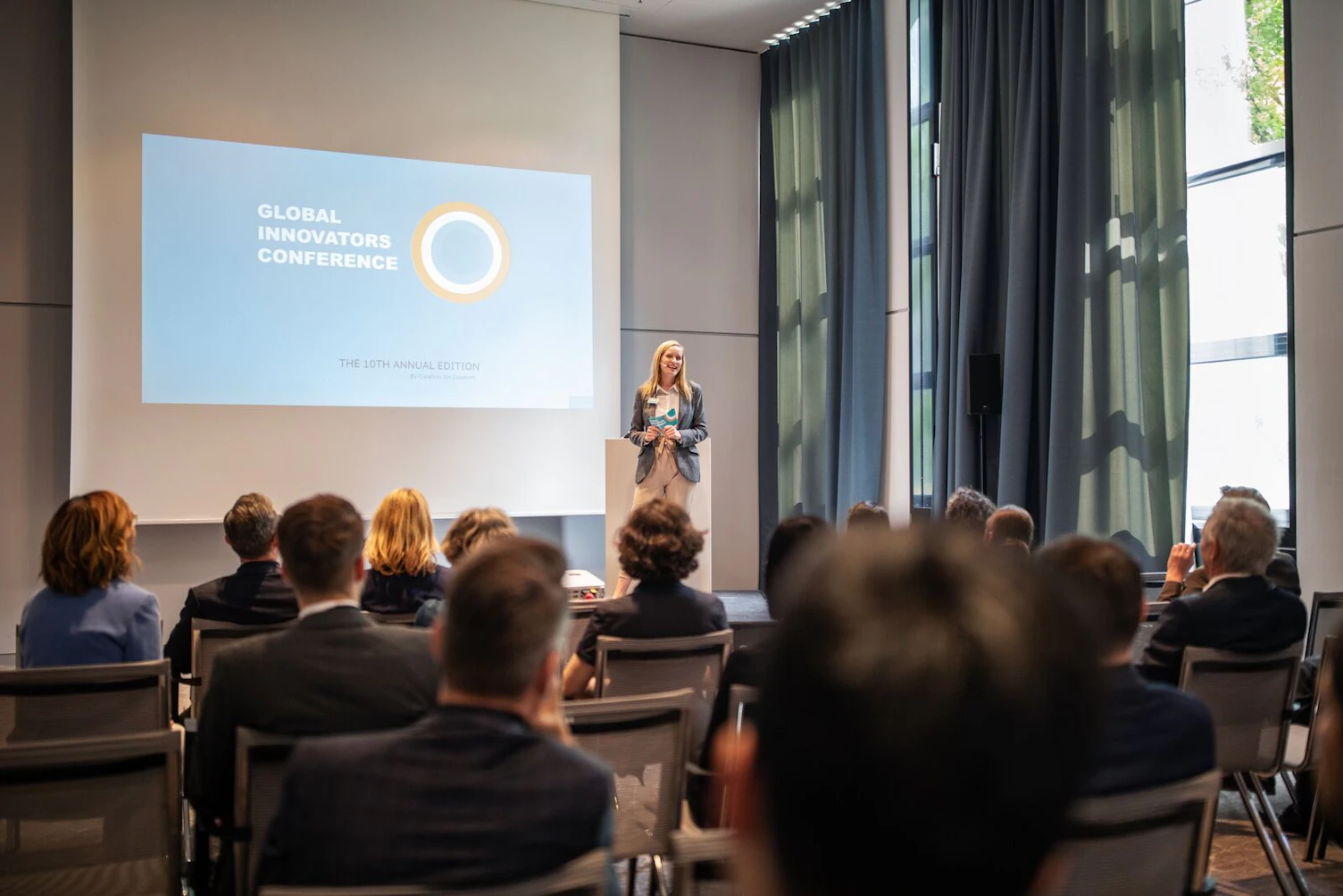 Businesswoman Presenting in a Conference