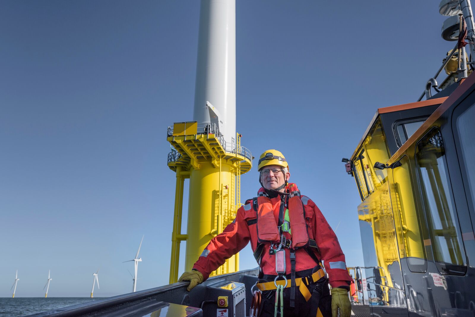 Engineer Inspecting Offshore Wind Farm