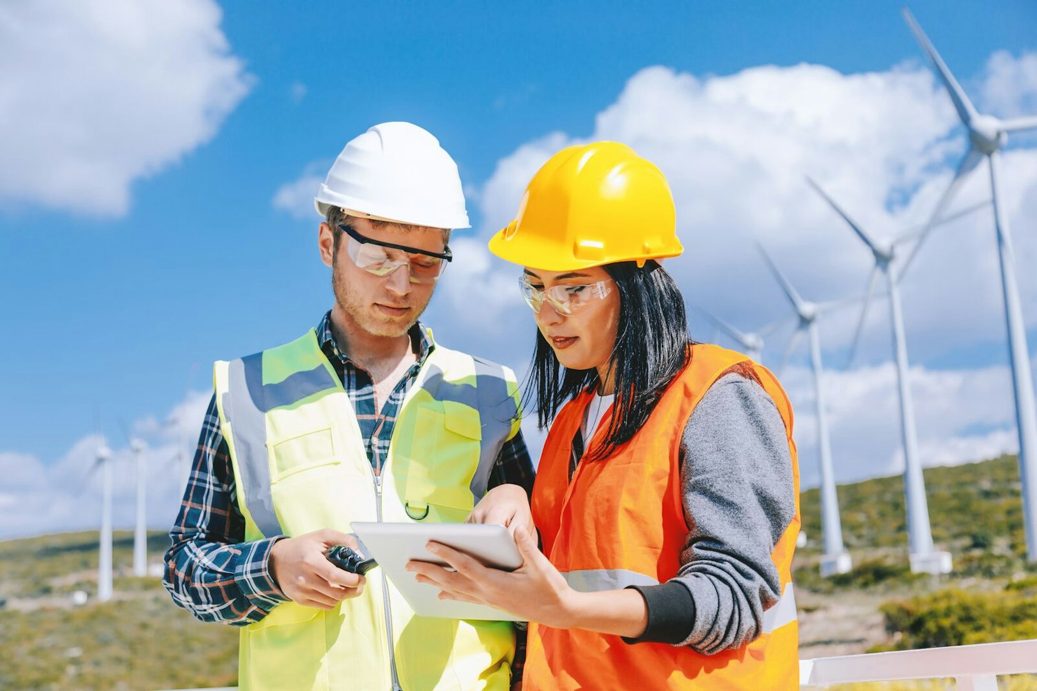 Engineers Checking a Wind Turbine Site System