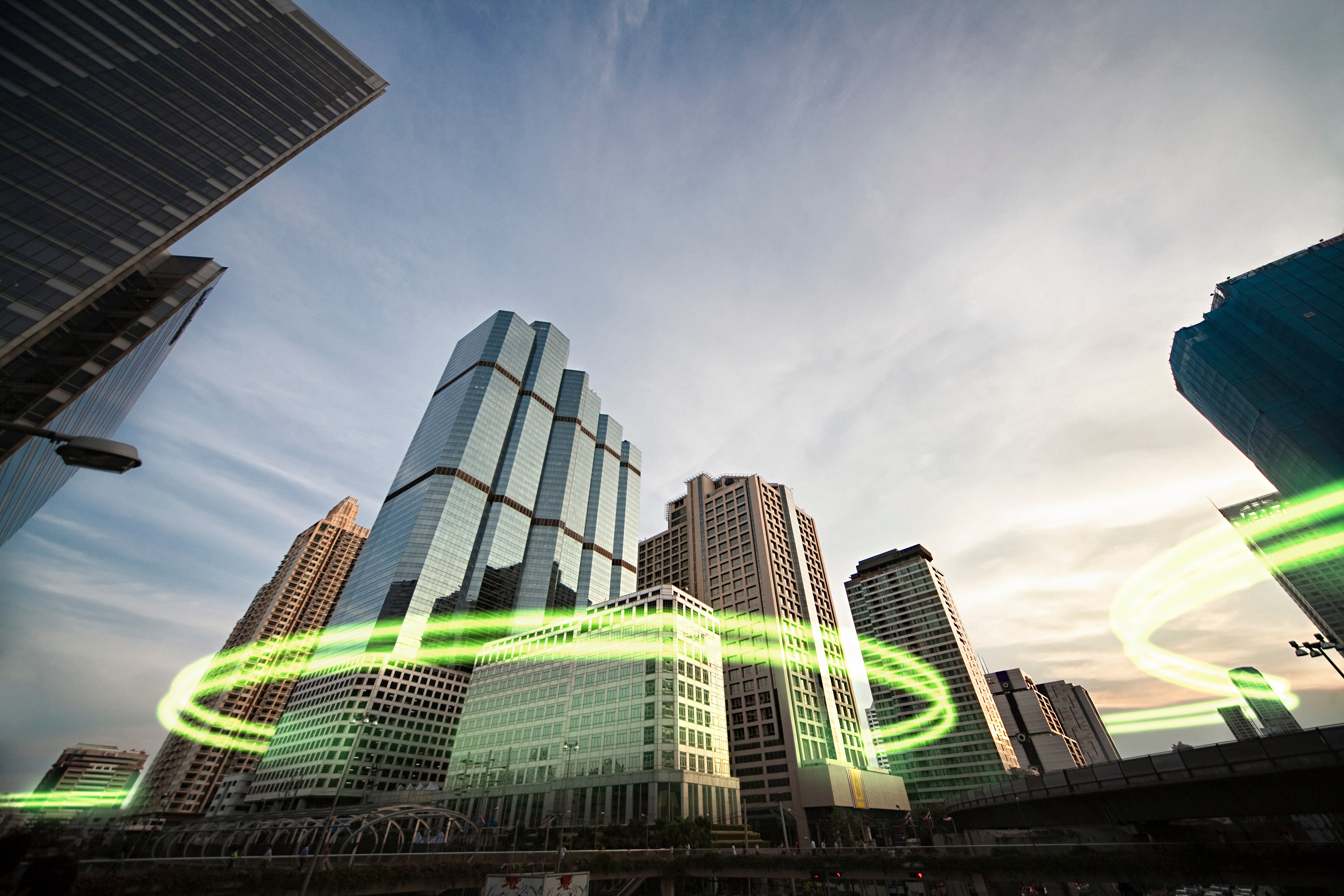 Green Light Surrounding Skyscrapers