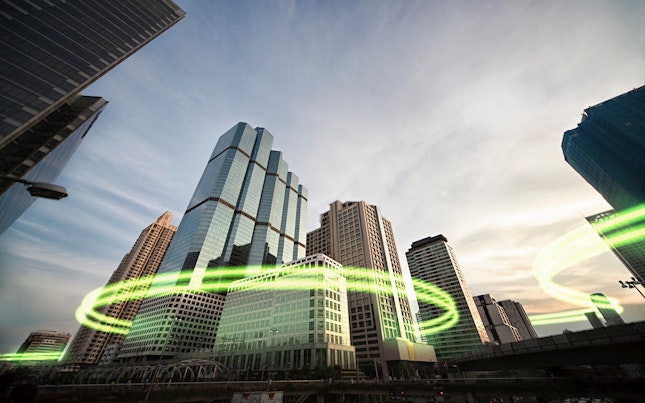 Green Light Surrounding Skyscrapers