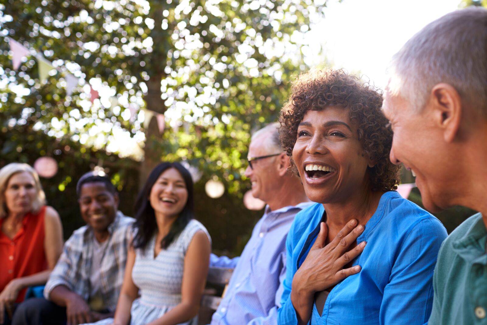 Group of Mature Friends Socialising in a Park