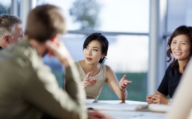 Group of People in a Business Meeting