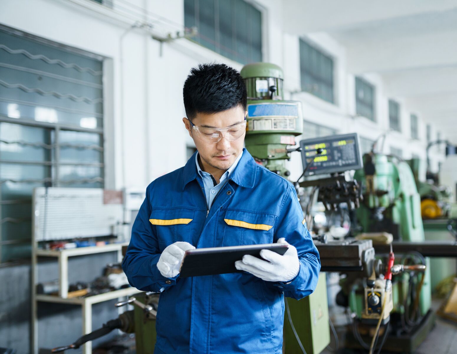 Industrial Engineer Working with a Tablet