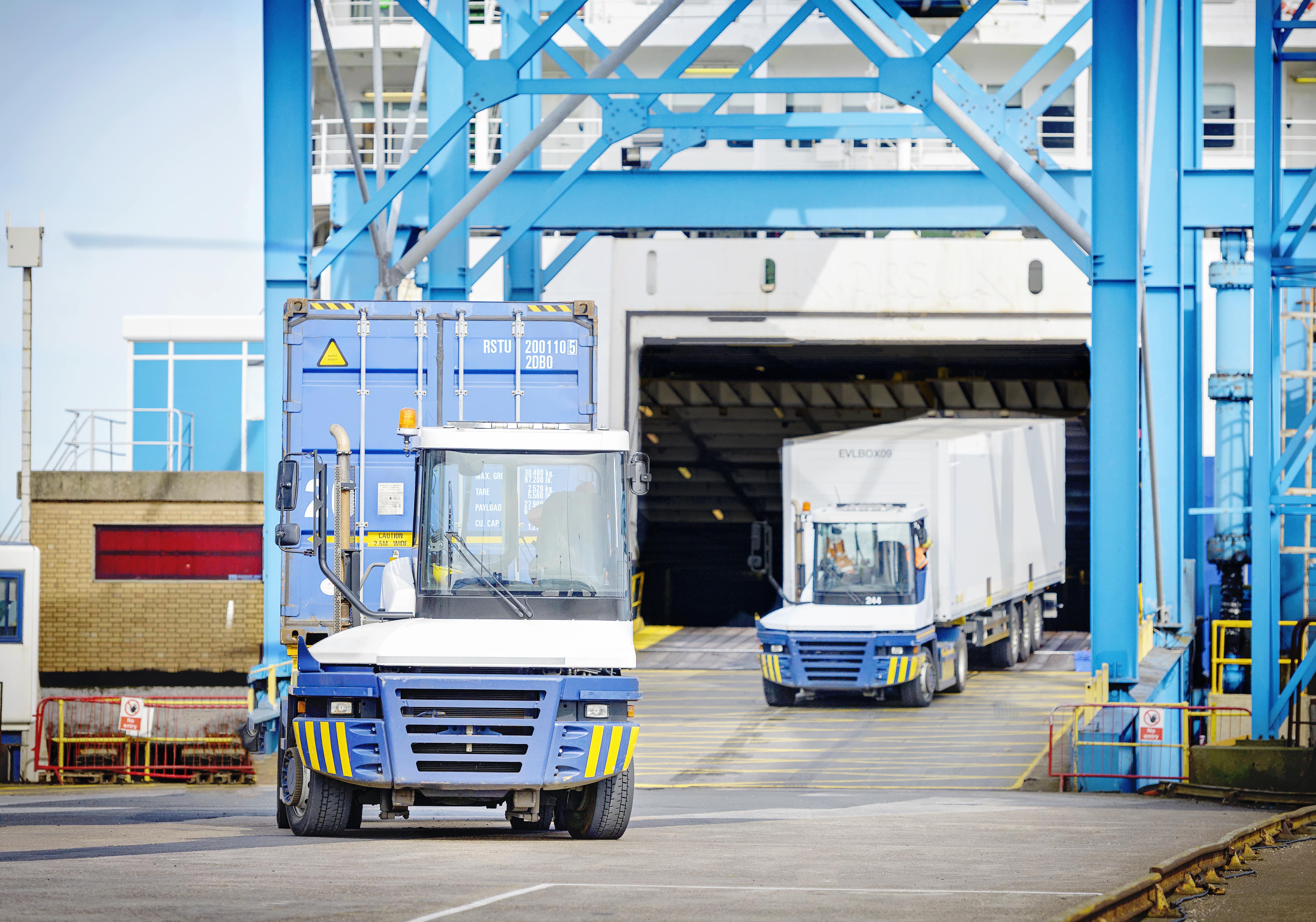 Lorries Carrying Goods Exiting a Ferry