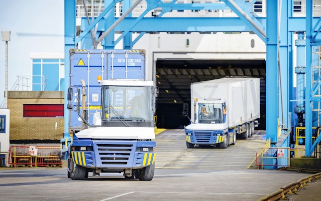 Lorries Carrying Goods Exiting a Ferry
