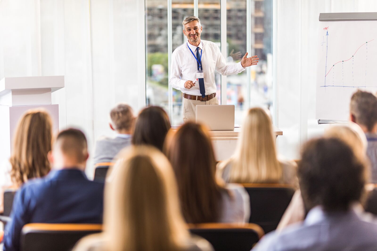 Man Presenting in a Conference Room