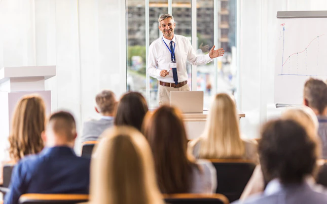 Man Presenting in a Conference Room