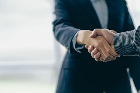 men shaking hands meeting business