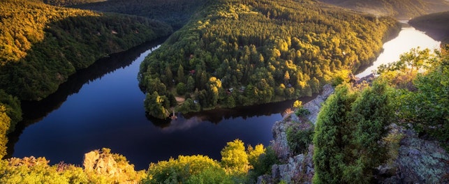 River Running through Alpine Landscape