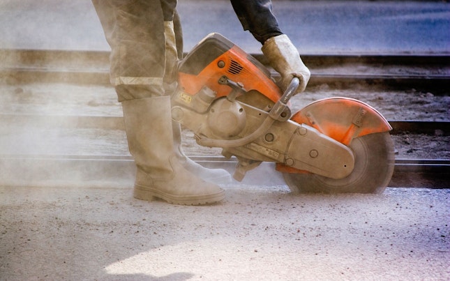 Road Worker with Circular Saw