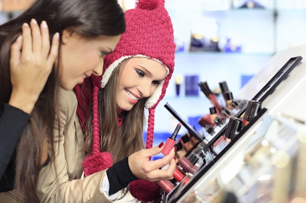 Two Woman Choose Cosmetics in Beauty Shop