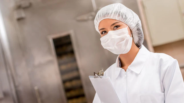 Woman Auditing a Food Factory