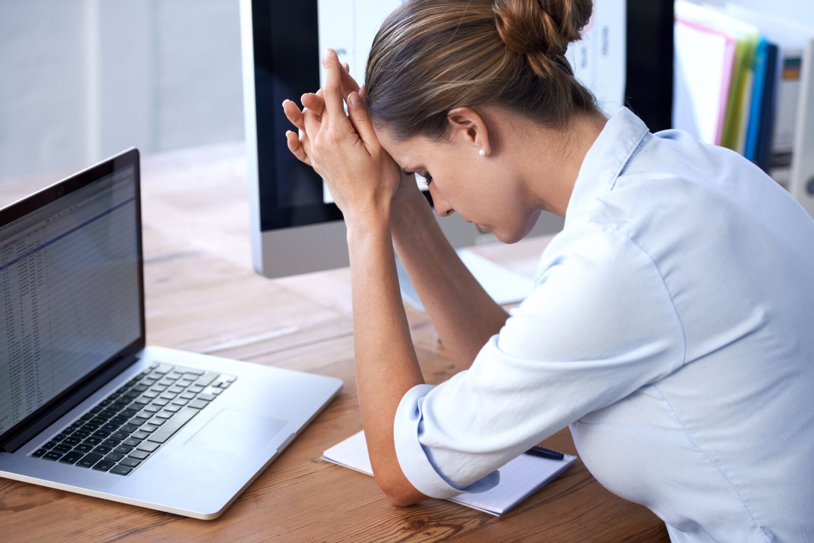 Woman Looking Upset at Work