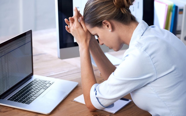 Woman Looking Upset at Work