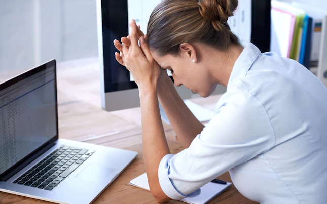 Woman Looking Upset at Work