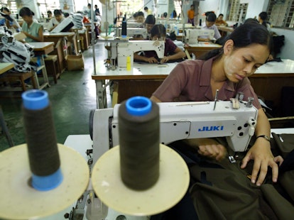 Woman Sewing in a Factory in Burma