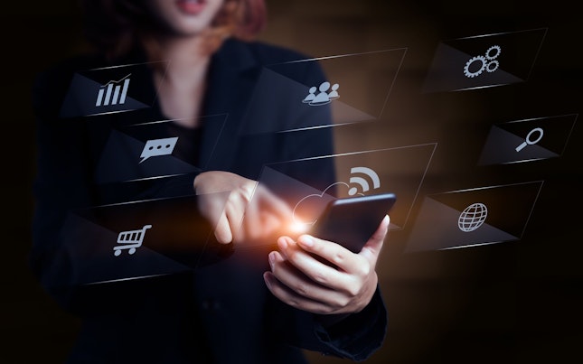 Woman Using Smartphone with Business Diagram Technology