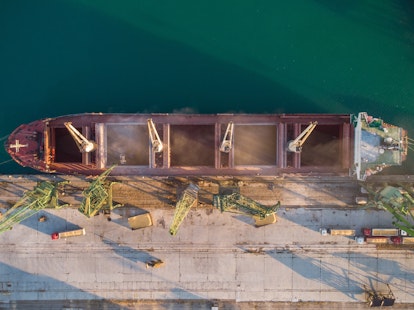 Aerial top view of big cargo ship