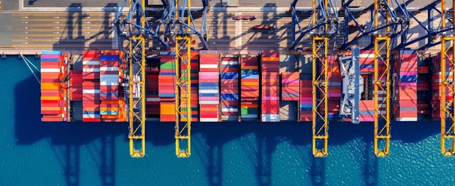 Aerial View of Cargo Ship and Cargo Container in Harbor