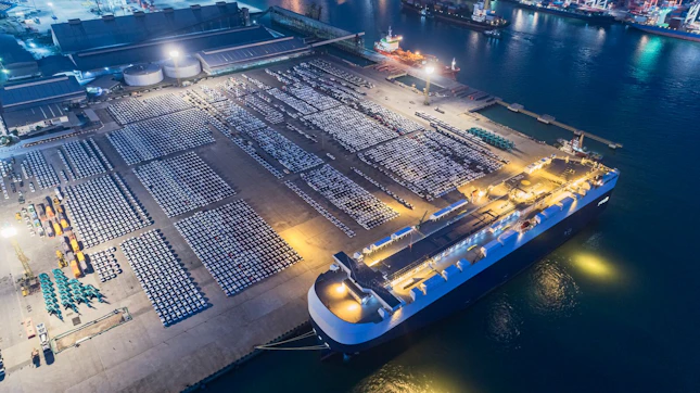Aerial View of Carrier Vessel Loading Cars