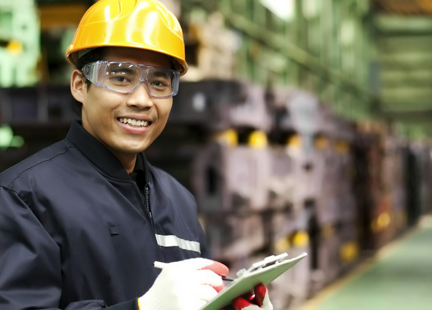 Auditor Carrying an Inspection at a Factory