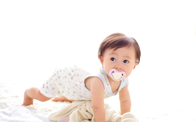 Baby Crawling with a Pacifier