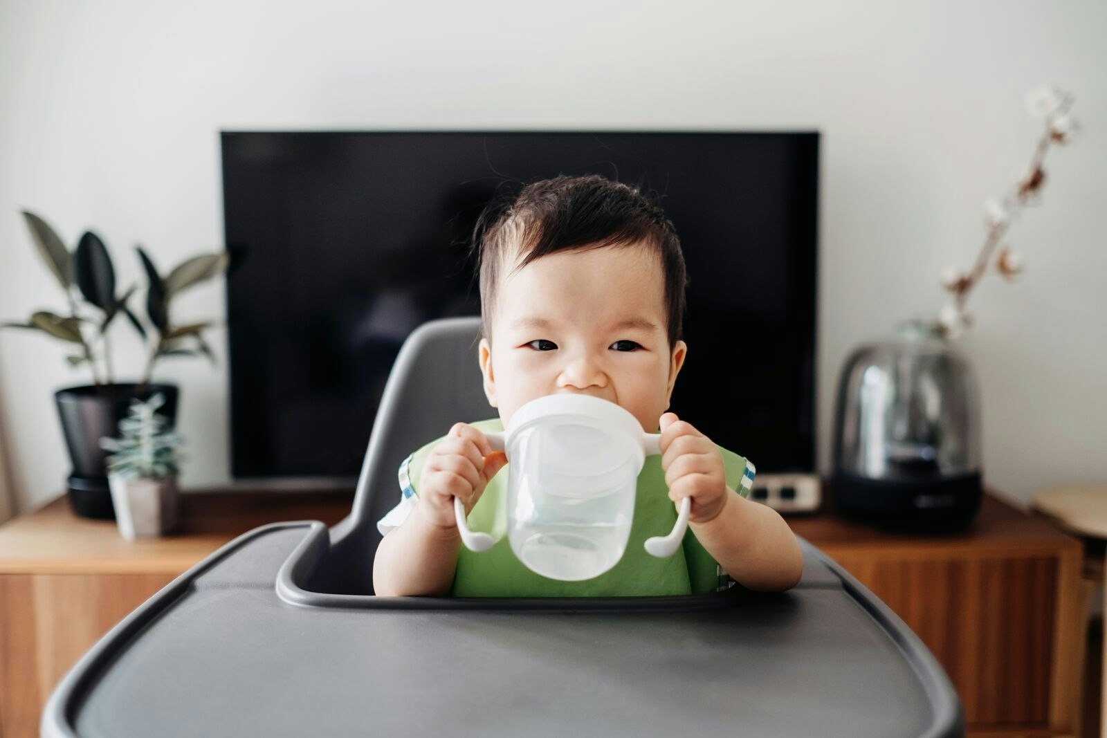 Baby Drinking Water from Sip Cup