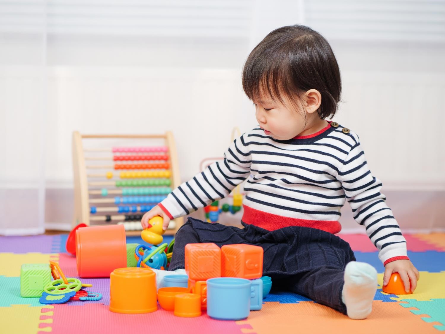 Baby Girl Play Toy at Home