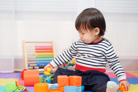 Baby Girl Play Toy at Home