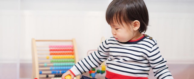 Baby Girl Play Toy at Home