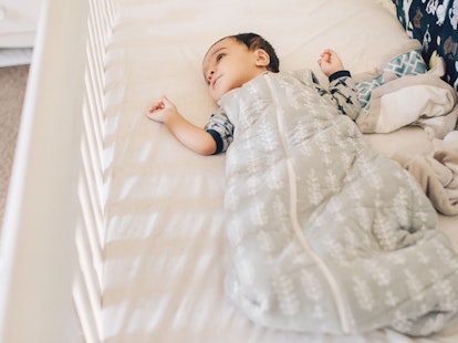 Baby Lying in a Crib