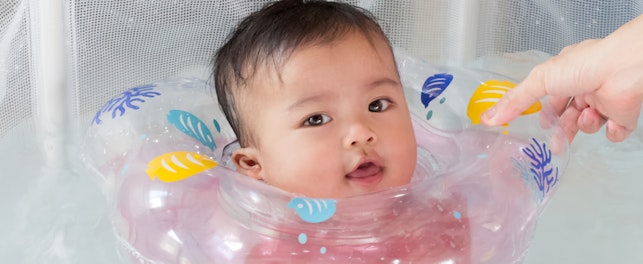 Baby Swimming with Neck Swim Ring in Swimming Pool