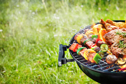 Barbecue grill with meats and vegetables