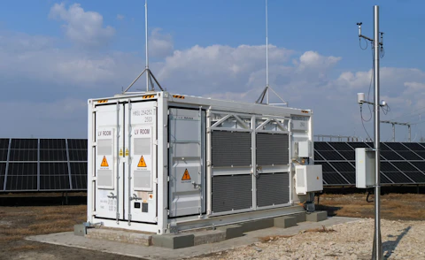 Battery Energy Storage System (BESS) Unit Integrated with Solar Farm for Renewable Energy Integration and Grid Stability