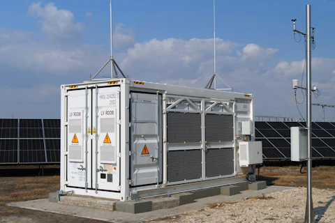 Battery Energy Storage System (BESS) Unit Integrated with Solar Farm for Renewable Energy Integration and Grid Stability