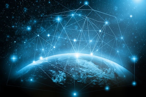 Earth from space with a glowing network of interconnected points and lines, symbolizing global digital connectivity or communication networks