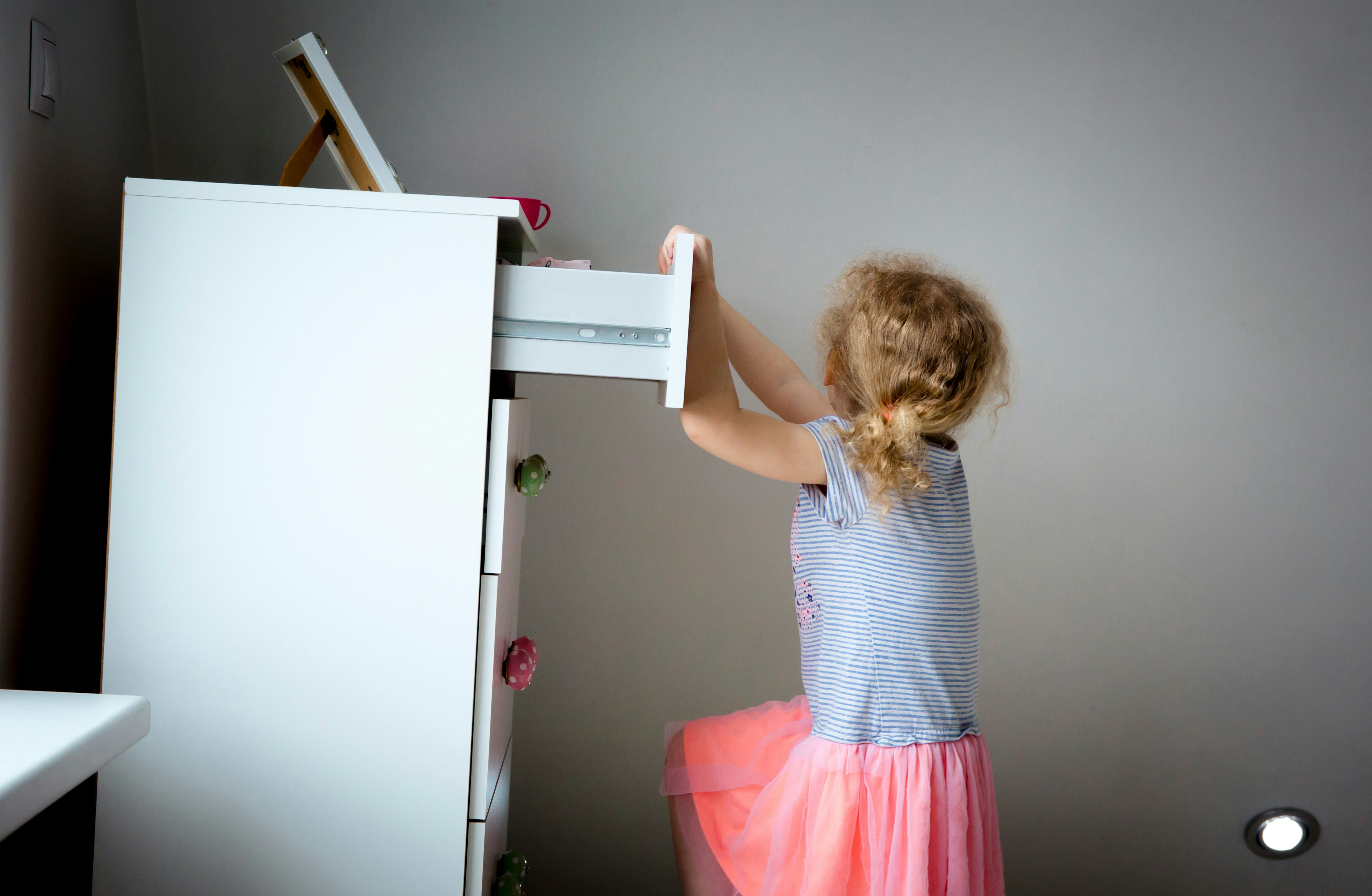 Child Climbing on High Dresser Furniture